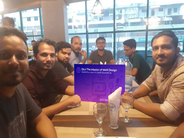 attendees of the Divi Dhaka June 22 meetup sitting at a restaurant table