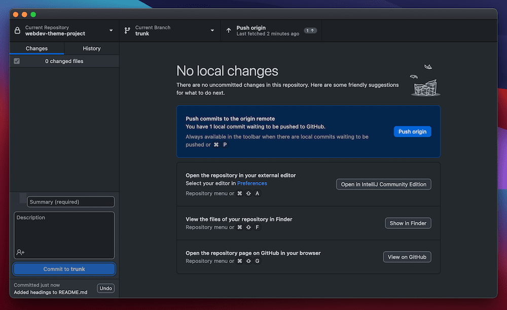 The GitHub Desktop interface showing that there are no local changes. There are a number of options in the main window to push commits to the remote repo, open the repo in an editor, view those files on your computer, and view the repo page within GitHub’s web interface