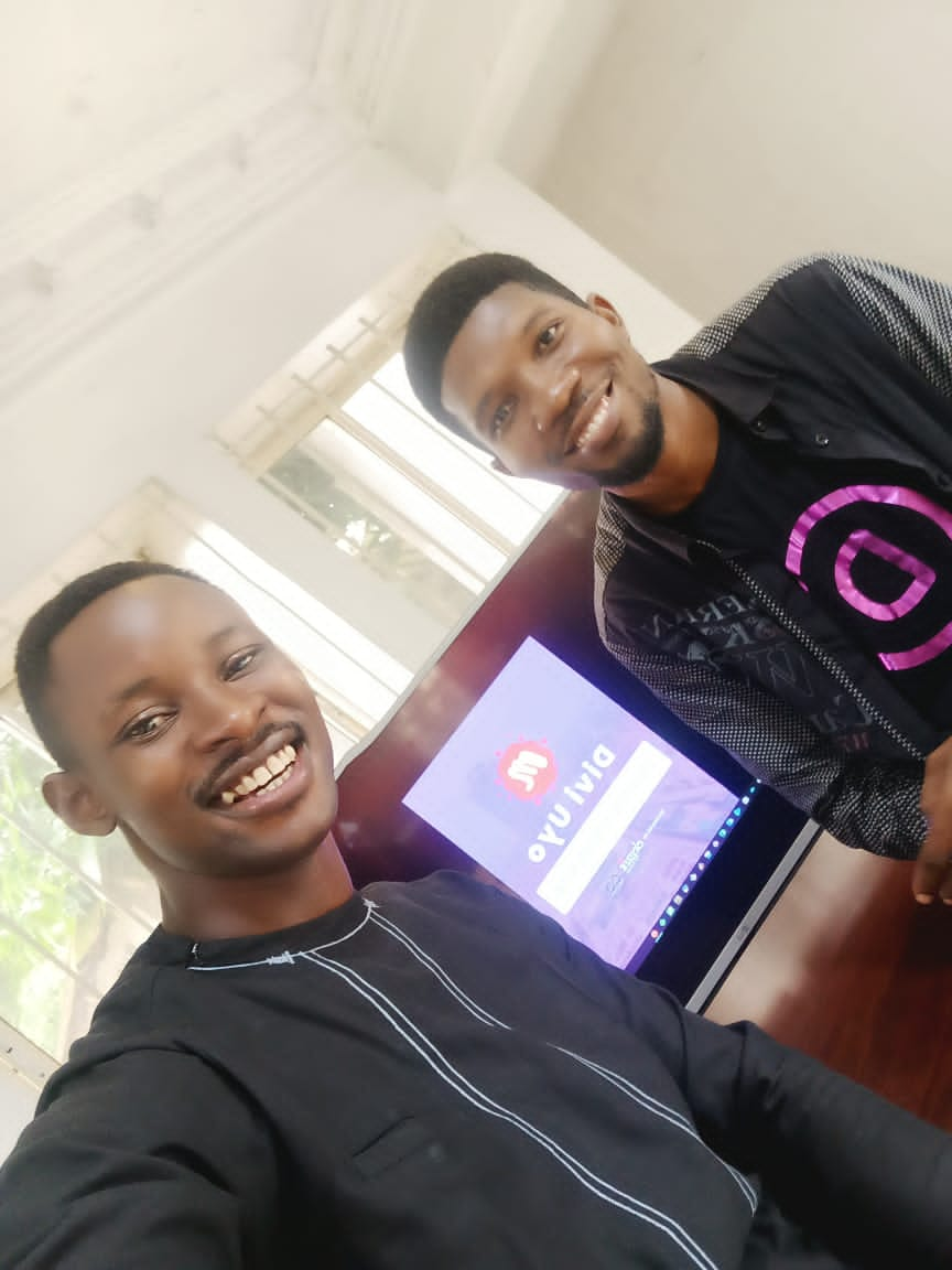 6 men standing next to each other at the Divi Uyo meetup